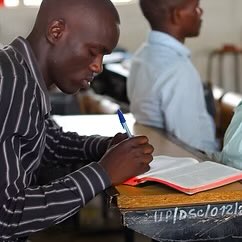 Person studying Christian education materials